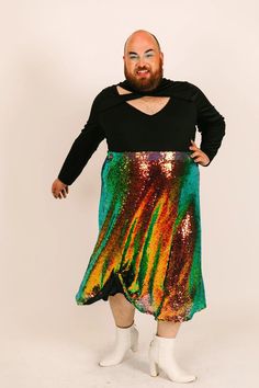 Introducing the Sequin Swing Skirt – where style meets sparkle and comfort meets glam! The elastic waist makes the garment comfortable and easy to wear. Dress the skirt up or down, it will fit easily into your wardrobe. Whether you're looking to make a statement at a party, add a touch of glam to your everyday life, or simply spread a little extra joy wherever you go – this skirt has got your back (and your twirl)! Because life's too short to blend in when you were born to stand out – and sparkl Sequin Tulle Skirt, Party Season Flowy Skirt For Night Out, Asymmetrical Skirt Bottoms For Party In Multicolor, Flowy Skirt For Night Out Party Season, Iridescent Sequin, Life's Too Short, At A Party, Wedding Guest Looks, Got Your Back