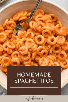 a bowl full of homemade spaghetti rings with the title overlay reading homemade spaghetti o's