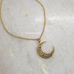 18K Gold Calligraphic Written on Moon Islamic Necklace, Engraving Moon Necklace, Arabic Necklace, Moon Necklace Gold, Minimal Moon Jewelry Details:- Length: 17 inches + Extender  Material: 18k gold plated, Brass Care:- When not wearing, please keep in a sealed plastic bag Packaging: All our pieces comes in a gift box bag so your item is ready to be gifted If you have any question feel free to contact us via Etsy message Happy Shopping Moon Shaped Necklace With Moon Print For Gift, Moon Print Necklace Perfect For Gifts, Moon Print Moon Shaped Necklace For Gift, Moon Print Moon-shaped Necklace Gift, Moon Print Moon Shaped Necklace Gift, Engraved Moon-shaped Brass Necklace, Engraved Moon Shaped Brass Necklace, Engraved Brass Moon Necklace, Gold Moon-shaped Engraved Necklace