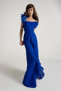 Long column party dress with bateau neckline and rounded back. A glamorous column dress with ruffled accents and shoulder-enhancing square neckline offset by spaghetti straps. Long Dresses Formal, Bridesmaid Dress Blue, Celestial Wedding Theme, Vera Wang Bridesmaid, Modern Bridesmaid Dresses, Weddings Dress, Celestial Wedding, Vera Wang Dress, Bridesmaid Proposals