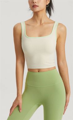 This tank top, made with 80% Nylon and 20% Spandex, is an embodiment of our brand's mission to harmonize yoga, meditation, and energy healing. Designed for everyday loungewear, its contemporary fit is perfect for the spring/summer season. The molded cup feature adds a touch of elegance, making this top a perfect blend of comfort and style. Enjoy the ease of machine wash care instructions. Celebrate your unique journey with this versatile piece from our collection. Summer Yoga Tank Top With Built-in Bra, Compressive Sleeveless Sports Bra For Spring, Green Tank Top With Built-in Bra For Yoga, White Tank Top With Built-in Bra For Yoga, Compressive Summer Tops For Pilates, Compressive Tops For Pilates In Summer, Compressive Tank Top With Built-in Bra For Summer, Fitted Summer Tops For Pilates, Fitted Tops For Pilates In Summer