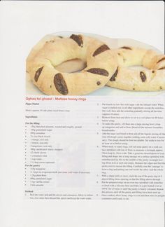 an advertisement for bagels with chocolate chips on top and in the middle, sitting on a white plate