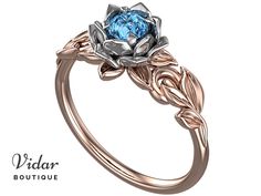 Blue Topaz Engagement Ring,Unique Engagement Ring,Flower Engagement Ring,Lotus Engagement Ring,Floral Engagement Ring,Leaves Engagement Ring by VidarBoutique on Etsy Flowers Engagement, Engagement Ring Nature, Ruby Solitaire Ring, Nature Engagement Ring, Nature Inspired Engagement Ring, Blue Topaz Engagement Ring, Floral Engagement Ring, Ring Ruby, Flower Engagement Ring