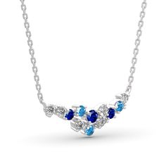 Dazzling with colour, this fashion necklace is certain to receive instant compliments. Created in sterling silver, this intriguing style showcases an array of stones - light blue, midnight blue and white stones - all placed along a curved bar design. Add this masterpiece to your jewelry box and you won't be disappointed.Carat Weight: 3.07 ctStone Size: 3,3.5,3 mmStone Type: Jeulia® StoneNumber of Stones: 12 Stone Shape: RoundStone Color: Diamond White, Aquamarine Blue, Sapphire BlueWeight: 2.1 g Blue Diamond Gemstone Necklace For Anniversary, Blue Gemstone Diamond Necklace For Anniversary, Blue Sapphire Diamond Necklace As A Gift, Blue Diamond Pendant Necklace For Anniversary, Blue Sapphire Pendant Diamond Necklace, Sapphire Diamond Necklace With Sparkling Stones, Sapphire Necklace With Sparkling Stones For Anniversary, Blue Cubic Zirconia Diamond Pendant Necklace, Dazzling Blue Necklace For Anniversary