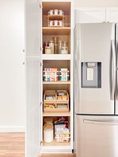 an organized pantry in the corner of a kitchen