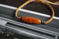 Nanhong Agate Long Charm: 27.2mm*8.5mm, adjustable from 7'' to 11'' Nanhong Agate Barrel Charm: 14.5mm*17.5mm, adjustable from 6.5'' to 11'' Colorful rope bracelet without charm: adjustable from 6'' to 9''  If you prefer smaller or larger size, please message me about custom sizing Nanhong Agate Clarity: opaque, unique color and high quality  We look forward to the opportunity of serving you！ Nanhong Agate, Adjustable Cord Bracelet, Cord Bracelet, Cord Bracelets, Bracelet Gold, Charm Bracelets, Unique Colors, Rope Bracelet, Custom Sizing