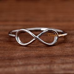 Minimalist Sterling Silver Infinity Ring, Infinity Symbol Promise Ring ▷Gift Box Included ▷5mm Height ▷Size 3 - 13 Available ▷925 Sterling Silver (not plated or filled) ▷925 Stamp Authenticity https://www.etsy.com/shop/TrendyRing Ring Gift Box, Silver Infinity Ring, Promise Ring Gift, Infinity Ring, Thumb Ring, Infinity Symbol, Thumb Rings, Girlfriend Gift, Gift For Girlfriend