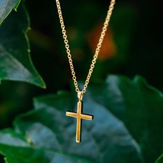 A sleek modern gold Cross necklace. Handcrafted in NYC with 18kt certified Fairmined Ecological gold that is toxic chemical free, sustainable, ethical and clean. Chain is 16" 18kt Fairmined gold. Please allow 3-4 weeks from your order date to be manufactured and ready to ship.Worldwide shipping. Free shipping within USA.Embrace newness. Purity is the new luxury. Cheap Minimalist Cross Pendant Necklace, Minimalist 14k Gold Cross Pendant Necklace, Gold Necklaces With Cross Pendant And Cable Chain, Gold Minimalist Tarnish Resistant Cross Necklace, Gold Cross Pendant Necklace With Cable Chain, Gold Cross Pendant Necklace On Cable Chain, Gold Necklace With Cross Pendant And Cable Chain, Gold Cross Pendant Cable Chain Jewelry, Gold Cross Pendant Jewelry With Cable Chain