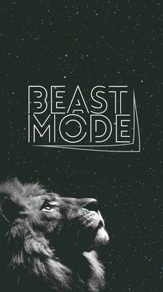 a black and white photo of a lion with the words beast mode on it's forehead