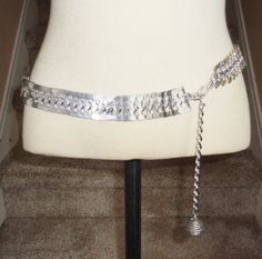 "This listing is for a Aluminum Metal Fish Scale Style Vintage 1980s Womens Belt in Silver tone Color. This has a hook closure. This main decorative part of the belt measures 32 inches long but has a chain that extends this as far as 38 inches. This measures 1 1/8 inch wide.  This is used but in good shape with no missing parts or pieces, no tarnish, no repairs. This is only signed \"Hong Kong\".  see pics." Vintage Adjustable Chain Belt For Party, 90s Belt, Womens Belt, Metal Fish, Silver Belt, Tube Skirt, Chain Belts, Silver Belts, Fish Scale