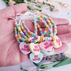 This Sweet Heart Bracelets are the perfect cute gift for all the special girls in your life. For other Valentines bracelet designs click on the link below: https://www.etsy.com/listing/1390110680 https://www.etsy.com/listing/1404334779 https://www.etsy.com/listing/1404336861 This listing is for your choose of one bracelet either in the child size or the adult size. It is adjustable and made with very strong and durable nylon string.  It is strung with pastel colored rainbow beads, silver plated Multicolor Jewelry For Best Friend Valentine's Gift, Multicolor Jewelry For Best Friend On Valentine's Day, Sweet Personalized Bracelets As Gift, Personalized Sweet Bracelets As Gift, Multicolor Friendship Bracelets For Valentine's Day, Cute Heart Beaded Bracelets For Valentine's Day, Valentine's Day Friendship Bracelets With Heart Beads, Cute Heart Beads Beaded Bracelets For Valentine's Day, Handmade Heart-shaped Friendship Bracelets For Birthday