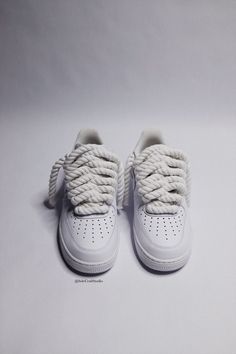 All white Air Force 1 with white 10mm rope laces. Fashionable chunky aesthetic strides boldly, making a statement with each step. Rope thickness is about 10mm Premium White chunky/thick cotton rope. Custom made-to-order sneaker. Brand new 100% authentic Nike AF1 Low with box! Free shipping within the US territory! Need a different color of rope Let us know which color you're looking for and we'll find it for you. Have an idea for your custom rope lace sneakers? Please send us a message here. We' All White Air Forces, Af1 Outfit, Twist Weave, White Air Force 1, White Air Forces, Wedding Sneakers, Air Force 1 Custom, White Rope, Cute Nike Shoes