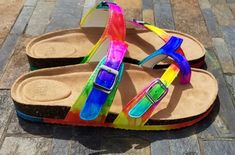 Be Soleful! Tie-Dye Birkenstock-style adjustable buckled slide sandals perfect for the hippie chick! Hand-colored and available in women's sizes 7-11. Be bright, be bold, and be colorful in these super comfy and cute tie-dye slide sandals! **Please note these are NOT the Birkenstock brand - they are made from high quality shoe that are just as cute and comfy** Multicolor Adjustable Sandals, Multicolor Adjustable Strap Sandals, Multicolor Summer Sandals With Adjustable Strap, Adjustable Multicolor Flip Flops For Spring, Adjustable Buckle Closure Sandals For Festival, Casual Multicolor Sandals With Adjustable Strap, Casual Multicolor Sandals With Buckle Closure, Adjustable Multicolor Open Toe Flip Flops, Adjustable Multicolor Slide Sandals