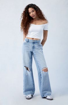 PacSun denim is back with a classic this season — the Eco Light Blue Ripped Low Rise Baggy Jeans! These super cute Y2K-inspired jeans sit low on the waist and feature an ultra-slouchy relaxed leg, a light blue wash, and ripped details at the knees for some added edge.

Learn more about PacSun eco items Low Rise Baggy Jeans, Womens Fashion Inspiration, Adidas Outfit, Baggy Jeans, Model Measurements, Pacsun, Low Rise, Jeans Size, Light Blue