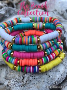 the beach collection bracelets are stacked on top of each other with colorful beads and gold accents