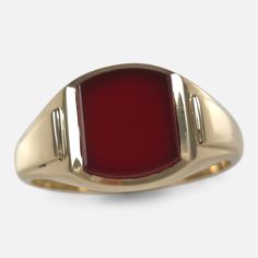 An 18ct yellow gold signet ring, unengraved, set with a carnelian. Hallmarked by the London assay office, marked '18' for 18 carat gold, with date letter 'C' for 1958. * Period: Mid 20th Century * Maker: W Wilkinson Ltd * Measurement: UK ring size X 1/2 (leading edge), US size 11 3/4 (leading edge); Carnelian: 10.5mm x 9.0mm * Weight: 10.1 grams Condition: Good, with light scratches and signs of vintage wear. Evidence of previous resizing. Item No: 2331_chan1. Link to our Etsy shop: https://www. Antique Signet Ring With Polished Finish For Formal Occasions, Heirloom Red Signet Ring With Polished Finish, Classic Gold Rectangular Ruby Ring, Classic Red Signet Ring For Formal Occasions, Classic Rectangular Ruby Ring In Gold, Classic Gold Ruby Ring With Rectangular Shape, Heirloom Red Gold Signet Ring, Antique Red 14k Gold Signet Ring, Antique Red Signet Ring In 14k Gold