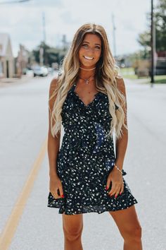 Sleeveless V-neck ruffled floral tunic dress.Shannon is wearing a size smallAdjustable straps﻿Size Chart:Small: Waist: 26 in. Bust: 34 in.Medium: Waist: 28 in. Bust: 36 in. Large: Waist: 30 in. Bust: 38 in.  This item is final sale. Summer Floral V-neck Dress With Ruffles, V-neck Sleeveless Dress With Floral Print For Day Out, Summer V-neck Floral Dress For Date Night, Flirty V-neck Sleeveless Dress For Spring, V-neck Sleeveless Dress With Ruffles For Day Out, Flirty V-neck Floral Summer Dress, Flirty V-neck Floral Dress For Summer, Spring Floral Dress With Spaghetti Straps And Ruffles, Summer Floral Dress With Spaghetti Straps And Ruffles