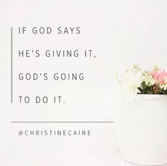 a white vase with flowers in it and a quote about god's giving it