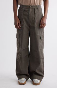 Tailored with a high waist and roomy legs, these pants crafted with soft cotton sport roomy pockets for essentials and a faded wash for an old-favorite feel. Zip fly with button closure Front bellows-patch pockets; back flap pockets; cargo flap-patch pockets 82% cotton, 18% polyester Hand wash, line dry Imported Designer Clothing Wide Cargo Pants, Baker Pants Outfit, Cargo Pants Men, Khaki Green, Pants Outfit, Cargo Pants, Acne Studios, Organic Cotton, Nordstrom