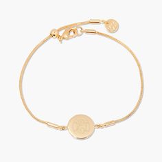 Discover a modern classic with the Wren Bracelet. Handcrafted with a gold snake chain, this unique design is engraved with your personalized initials and adjustable for the perfect fit. An enchanting addition to any look. Are you ready to make a lasting impression? Available in 14k gold plated brass Disc size: 1/2" Adjustable snake chain up to 7" Lobster claw closure With engraving this item is FINAL SALE SKU: BYB1097 Adjustable Everyday Jewelry With Initials, Classic Adjustable Snake Chain Bracelets, Everyday Adjustable Jewelry With Initials, Modern Adjustable Jewelry With Initials, Modern Adjustable Initials Jewelry, Adjustable Gold Sterling Silver Name Bracelet, Adjustable Sterling Silver Name Bracelet In Yellow Gold, Adjustable Engraved Snake Chain Jewelry, Elegant Monogram Name Bracelet For Everyday