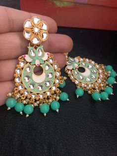 Green Kundan Chandbalis With Gota Work, Green Meenakari Danglers For Eid, Handmade Kundan Chandbalis For Festive Occasions, Kundan Chandbalis With Mirror Work For Gift, Party Kundan Chandbalis With Meenakari, Party Chandbalis With Meenakari And Kundan, Kundan Meenakari Danglers For Eid, Bollywood Style Meenakari Earrings For Eid, Green Kundan Danglers For Eid