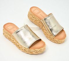 This fashionable flatform sandal pairs sleek leather with boho-chic raffia, creating a cool juxtaposition that's just as at home at the beach resort as it is in the city center. From Dolce Vita. Chic Slip-on Wedge Sandals With Woven Sole, Summer Espadrille Wedge Sandals With Textured Sole, Chic Wedge Sandals For Summer Beach, Chic Summer Wedge Sandals For Beach, Chic Summer Beach Wedge Sandals, Natural Textured Summer Espadrilles, Summer Natural Wedge Sandals With Textured Footbed, Summer Straw Espadrilles With Cushioned Footbed, Summer Espadrille Wedge Sandals With Textured Footbed