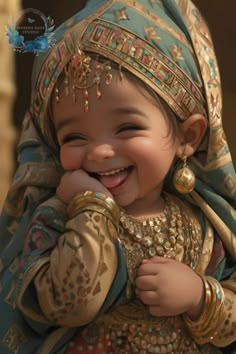 a smiling baby dressed in an elaborately designed outfit and headdress, with her hands on her chin