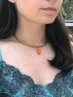 Handmade green beaded choker necklace with genuine orange quartzite stone pendant! Simple design, yet adds a bold and fun touch to any outfit. Available in multiple sizes. Perfect for summer and days at the beach. Please reach out with any questions or concerns (sizing, adjustments, repairs, etc.) Adjustable Beaded Necklaces With Natural Stones For Summer, Adjustable Natural Stone Beaded Necklaces For Summer, Adjustable Natural Stones Beaded Necklace For Summer, Green Bohemian Choker For Summer, Bohemian Green Choker For Summer, Casual Green Choker Jewelry, Casual Green Choker Necklace, Adjustable Beaded Necklaces With Gemstone Beads For Summer, Adjustable Gemstone Beaded Necklaces For Summer