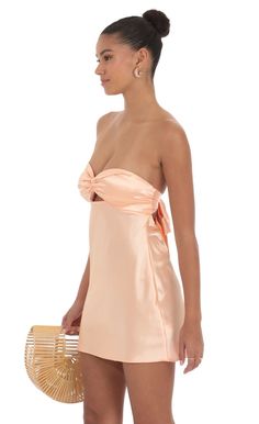 Satin Strapless Twist Cutout Dress in Peach | LUCY IN THE SKY Homecoming Satin Dresses, Homecoming Dresses Baby Pink, Purple Princess Polly Dress, Lucy In The Sky Mini Dress, Basic Hoco Dresses, Brunette Hoco Dresses, Light Hoco Dresses, Yellow Silk Hoco Dress, Wofo Dresses