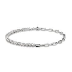 This beautiful bracelet is a perfect combination of classic and contemporary. Set in chic sterling silver, half of the bracelet is adorned with sparkling white lab-created sapphires, and the other half features a paperclip-link design. The 7.25-inch bracelet secures with a spring ring clasp. Silver Elegant Paperclip Bangle Bracelet, Elegant Silver Paperclip Bangle Bracelet, Modern White Diamond Cut Bracelet, Classic Silver Paperclip Bracelet With Jubilee Detail, Modern Silver Diamond Bracelet With Diamond Cut, Modern White Jubilee Tennis Bracelet, Modern Sterling Silver Cubic Zirconia Bracelet, Silver Paperclip Bracelet For Formal Occasions, Modern White Tennis Bracelet For Anniversary