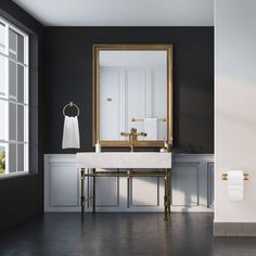 a bathroom with black walls and white fixtures, including a gold framed mirror over the sink