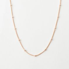 An essential chain with a texture that makes layering easy. Looks great with other pieces, or as an everyday staple on its own. Everyday Layered Link Chain Necklace, Minimalist Snake Chain Layered Necklace, Delicate Everyday Jewelry With Ball Chain, Minimalist Everyday Jewelry With Ball Chain, Dainty Beaded Chain Layered Necklace, Delicate Chain Necklace For Layering, Dainty Everyday Chain Necklace, Everyday Minimalist Jewelry With Ball Chain, Simple Everyday Yellow Gold Chain Necklace