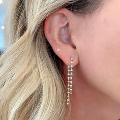 These Diamond Bezel Link Front and Back Earrings are available in 14k yellow gold. They are the perfect statement to take you from out to dinner to a black tie event. This modern linear silhouette is shorter in the front then the back. For the girl who is fashion forward and not afraid of a little drama. Can be special ordered in rose or white gold. Back strand of diamonds slides on and off post and is secured with a clutch 0.78 ct total weight Front strand is 1.5". Back strand is 2.1" Luxury Diamond Cut Linear Earrings, Gold Linear Earrings With Prong Setting, 14k Gold Linear Earrings For Evening, Long Drop Diamond Earrings For Party, Modern White Gold Diamond Earrings For Party, White Gold Linear Earrings For Party, Party Long Drop Diamond Earrings, Luxury Linear Earrings For Party, Modern Diamond Earrings For Evening