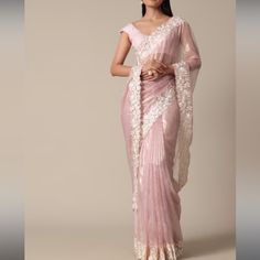 This Piece Is A Saree. Comes With Stitched Blouse . It Is Size 36 Which Is Medium In Women . It Is Not Pre Stitched . Fabric .Satin . Very Light Weight And Beautiful Saree. Wore Just For An Hour For Nikkah / Wedding .Comes With Pink Peticoat. Pre-draped Organza Saree With Pallu, Organza Pre-draped Saree With Pallu, Designer Wear Pre-draped Organza Saree, Designer Organza Pre-draped Saree, Bollywood Style Organza Pre-draped Saree, Fitted Chanderi Blouse With Sheer Dupatta, Elegant Cotton Silk Blouse With Sheer Dupatta, Organza Blouse With Traditional Drape, Wedding Blouse With Chikankari Embroidery In Tissue Silk