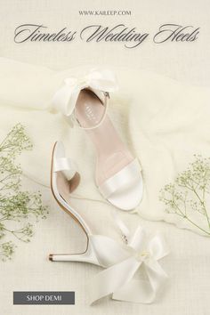 Wedding Heels with Bow Satin Low Heel Wedding Heels, Low Heel Satin Wedding Heels, Summer Wedding Satin Shoes, High Heel Satin Sandals For Wedding, Elegant Satin Wedding Shoes, Elegant Wedding Heels With Bow Straps, Open Toe Wedding Shoes With Satin Bow, White Satin Bow Wedding Shoes For Bridesmaids, Satin High Heel Wedding Shoes