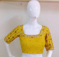 Pure raw silk blouse with maggam work on neck sleeves and back neck. Custom fitted. -Measurements sheet will be sent to you once you order( Standard sizing also available) -Custom colors available -Work on front back and sleeves. Yellow Chanderi Blouse With Pallu, Chanderi Yellow Blouse With Pallu, Yellow Chanderi Bollywood Blouse, Yellow Bollywood Chanderi Blouse, Designer Dola Silk Yellow Blouse, Designer Yellow Dola Silk Blouse, Fitted Yellow Dola Silk Blouse, Yellow Unstitched Art Silk Blouse, Yellow Silk Blouse With Resham Embroidery