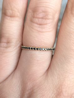 "- BLACK DIAMOND 3/4th Eternity Pave Band/ Anniversary Band/ Wedding Band/ Stackable Ring/ Matching Wedding Band MaterialGold (14K & 18K) or PLATINUM FinishingHigh Polished/ Shiny PlatingRhodium (only if WHITE gold) FitComfort/ Rounded Interior Width1.6 mm Height1.6 mm SettingU Micro Pave Set (Reminds the Letter \"U\" from sides) StonesGenuine Diamonds ColorBlack QualityAAA Total Caratapx 0.40 This Ring is Full of Elegance and Beauty! It is so Simple and so Complete at the same time! One can Black Round Eternity Band For Anniversary, Black Eternity Band For Anniversary, Elegant Black Eternity Band For Anniversary, Black Stackable Round Cut Rings, Black Diamond Wedding Ring With Round Band, Elegant Black Bands For Anniversary, Elegant Black Anniversary Bands, Elegant Black Wedding Bands, Black Diamond Ring With Vvs Clarity In 14k Gold