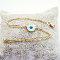 - Evil Eye Mother of Pearl Bracelet for Women is made with high quality 14K real solid gold . -We have listed a necklace with the same design. https://www.etsy.com/listing/937997647/evil-eye-mother-of-pearl-necklace-for - Circle bracelet is with decorated mother of pearl . Its diameter is 1 cm(0.39 inch) - 14K cute, charm, dainty, delicate, elegant Evil Eye Mother of Pearl Necklace is also called Turkish nazar protection, lucky, good luck, Greek eye bracelet . - You receive evil eye mother of pe Yellow Gold Charm Bracelet As Gift, 14k Yellow Gold Bracelet Gift, Gift 14k Yellow Gold Bracelet, Spiritual 14k Gold Bracelet As A Gift, Yellow Gold Tarnish-resistant Bracelet For Gift, Gold-plated Yellow Gold Charm Bracelet Gift, Yellow Gold Plated Charm Bracelet Gift, 14k Gold Bracelet Jewelry Gift, Gold-plated White Gold Bracelet For Gift