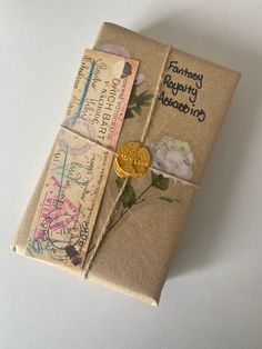 a small book with some flowers on it