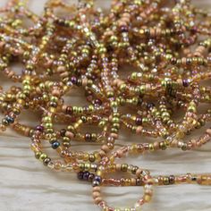 "You are buying 6 strands 20\" long each of Golden Glitter Mega Mix Czech Seed Beads in size 8/0. There are about 14 beads per inch, and you can expect to receive 1680 beads in a set. The size of a bead is about 3mm with0.9mm hole. These beads are in fabulous colors of the golden summer. You will fall in love with these beads... Please, take a close look at my pictures to see the variety beads you will receive. Thank you for stopping by, and HAPPY BEADING" Golden Summer, Golden Beads, Golden Glitter, The Golden, Seed Beads, Etsy App, Selling On Etsy, My Pictures, Sell On Etsy