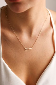 "Gold personalized initial necklaces has a small heart right on middle and these dainty necklace great personalized jewelry idea to yourself, best friends or any women. They going to love this special pendant necklace. Our gold initial pendant couple necklaces is  great way to make any women happy with minimalist necklace design. 💖  ♥ Personalized piece for yourself or for someone special in your life.. ♥ Make your choice from this custom necklace for baby shower gifts, new mom gifts, Mothers Day gifts, birthday gifts, gift for mom and anniversary gifts. Amazing gift for her..  ✋ All our jewelry is %100 custom made by hand with Love and Care in our workshop! Nickel Free High Quality Materials Standard Deliver in 8-12 Business Days *How to customize name necklaces? Leave a not at \"Note to Initials Pendant Necklace, Letter Gold Necklace, Elegant Initial Pendant Name Necklace For Mom, Dainty Initial Necklace With Clavicle Chain For Mother's Day, Delicate Name Necklace With Initial Pendant, Initial Pendant Jewelry For Best Friend Gift, Dainty Initial Necklace For Valentine's, Simple Custom Name Necklace, Simple Initial Pendant Necklace As Personalized Gift