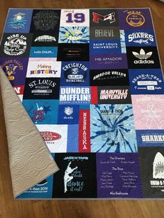 a quilt made to look like it has many different logos on it