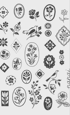 an image of some flowers and birds in the shape of ovals on a white background