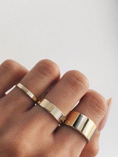 A 10mm minimal band made from sterling silver, bold simplicity - a timeless silhouette. Shop it in our wide and slim silhouettes for the full set. *MEN'S SIZING: We recommend a size 8 for pinky or ring finger The Minimalists, Minimal Flat, Girl Jewelry, Jewelry Inspo, Cute Jewelry, Gold Bands, Ring Verlobung, Ring Designs, Women Rings