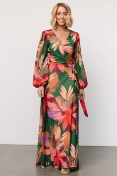 True wrap style for your every vacay need Green with multicolor tropical floral print Chiffon material that flows beautifully True wrap style with waist tie Flattering surplice neckline Long sleeves with elastic cuffs Maxi skirt length Fully lined, excluding sleeves Self and Lining: 100% Polyester Trina is 5'6, cup size 32D, size 2 and is wearing size S Summer Floral Print Wrap Dress For Vacation, Green Tie Waist Wrap Dress For Vacation, Floral Print Maxi Wrap Dress For Vacation, Printed V-neck Wrap Dress For Vacation, Floral Print Wrap Dress For Beach, Floral Print Wrap Dress For Vacation, Multicolor Floral Print Wrap Dress For Beach, Floral Wrap Dress For Beach, Tropical Formal Wedding Attire