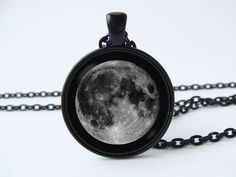 Lunar necklace Girlfriend gift Moon pendant Gray moon Lunar jewelry Full moon jewelry Moon jewellery Moon necklace Moon gift Moon phasesIn the options you can choose: Style, Metal color and Engraving.Jewelry is made up of metal base, chain or key ring, glass lens and image.Pendant size: 1 inch (2.5cm).If you chose in the option "+Engraving", please write the text, words or date for engraving. This text will be engraved on the back of the product.I will place the text in one or more lines, depend Moon Print Moon Shaped Necklace Gift, Moon Print Moon-shaped Necklace Gift, Moon Print Moon Shaped Necklace For Gift, Moon Shaped Necklace With Moon Print For Gift, Moon Print Necklace Perfect For Gifts, Circle Moon Charm Necklace For Gift, Black Necklace With Sun And Moon Design As Gift, Black Moon Charm Jewelry For Gift, Celestial Moon Shaped Necklace With Moon Print