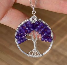 "This beautiful Amethyst Tree of Life Pendant is hand wire wrapped with purple Amethyst gemstone using .925 Sterling Silver wires for the tree trunks an branches. It is a beautiful gift to give or receive! A Birthstone for the February! ~~The pendant measures about between 1.35 to 1.40inch in diameter. The US quarter coin is about 1 inch(25mm) in diameter. ~~The pendant comes on a .925 Sterling Silver cable chain. The chain is flexible and durable enough to hold the pendant. if you would like di Lavender Natural Stones Jewelry Gift, Spiritual Amethyst Jewelry For Gifts, Nickel-free Amethyst Pendant Jewelry, Nickel Free Amethyst Round Pendant Jewelry, Nickel-free Amethyst Round Pendant Jewelry, Lavender Wire Wrapped Jewelry For Gifts, Nickel-free Lavender Dangle Jewelry, Lavender Nickel-free Dangle Jewelry, Amethyst Birthstone Dangle Jewelry