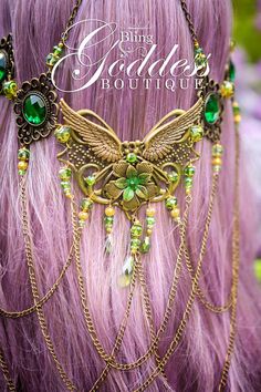 Forest Goddess Circlet Make a grand entrance with attitude in this whimsical earthy brass toned circlet with glittering green crystals. A winged embellishment adorns the back of the circlet and creating a stunning focal point, this beautiful circlet is dripping with crystal Bohemian Teardrop Crown For Festivals, Gold Fantasy Crown For Festival, Mystical Festival Crown Headpiece, Fantasy Green Jewelry For Festival, Fantasy Gold Jewelry For Costume Party, Green Fantasy Jewelry For Festival, Gold Fantasy Costume Jewelry, Handmade Fantasy Body Jewelry For Festivals, Green Fantasy Festival Jewelry