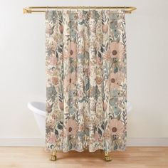 a shower curtain with flowers and leaves on it in an empty room next to a bathtub