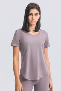 Size: Relax fit Pattern: Plain Feature: Short sleeve. curve hem. pullovers Neckline: Crewneck Sheer: No Stretch: Highly stretchy Measurements: Size 4: length 24 in. bust 36 in. underbust 37 in. sleeve 7 inSize 6: length 25 in. bust 37 in. underbust 39 in. sleeve 7 inSize 8: length 25 in. bust 39 in. underbust 40 in. sleeve 7 inSize 10: length 26 in. bust 41 in. underbust 42 in. sleeve 7 inSize 12: length 26 in. bust 42 in. underbust 43 in. sleeve7 in Material composition: 80% nylon. 20% spandex Care: Machine wash cold. Tumble dry low. Imported Shipping time: 5-10 business days Athleisure Short Sleeve Crew Neck Top For Workout, Sporty Stretch Short Sleeve Workout Top, Stretch Crew Neck T-shirt For Light Exercise, Sporty Stretch Short Sleeve Top For Workout, Solid Color Scoop Neck Gym Top, Moisture-wicking Relaxed Fit Tops, Fitted Scoop Neck Sportswear Top, Stretch Athleisure Short Sleeve Top, Stretch Athleisure Short Sleeve Top For Workout